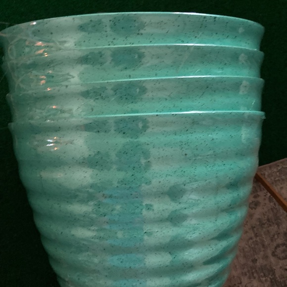 Set of four teal planter buckets